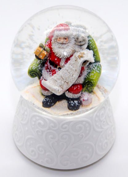 Edle Schneekugel auf weißem Porzellansockel Santa mit Spieluhr - Schneekugelhaus