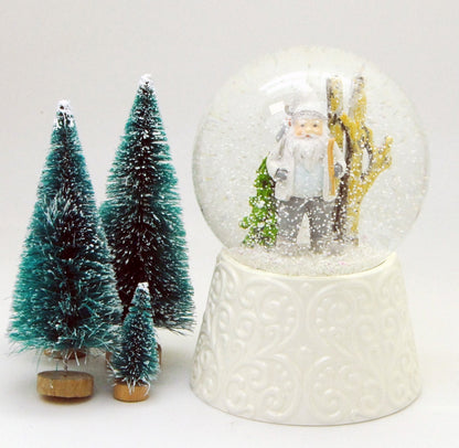 Edle Schneekugel Santa weiß auf weißem Porzellansockel 100 mm Durchmesser mit Spieluhr - Schneekugelhaus