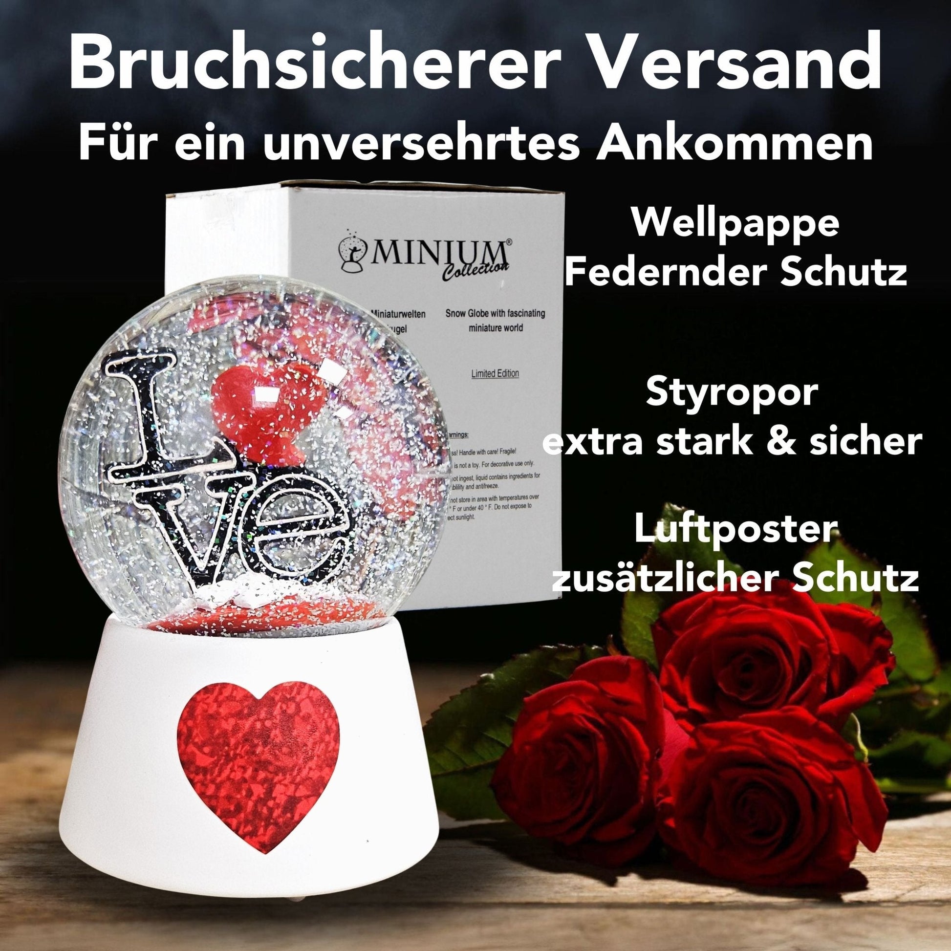 Moderne Designer Schneekugel LOVE auf Sockel weiß rotes Herz mit Spieluhr 100 mm Durchmesser - Schneekugelhaus
