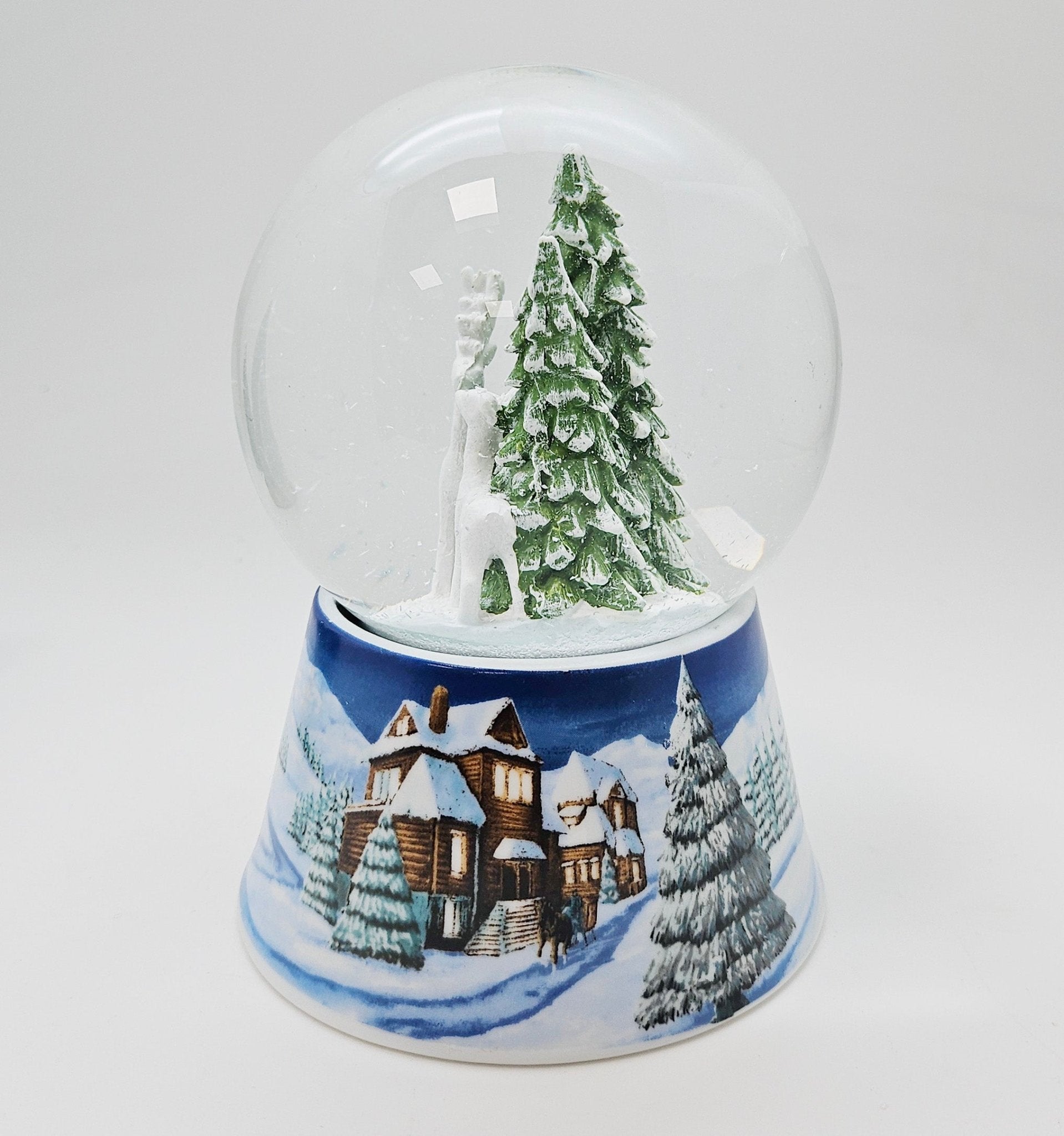 Nostalgische Schneekugel 2 Rehe auf Sockel Winterlandschaft mittelblau 100 mm Durchmesser mit Spieluhr - Schneekugelhaus