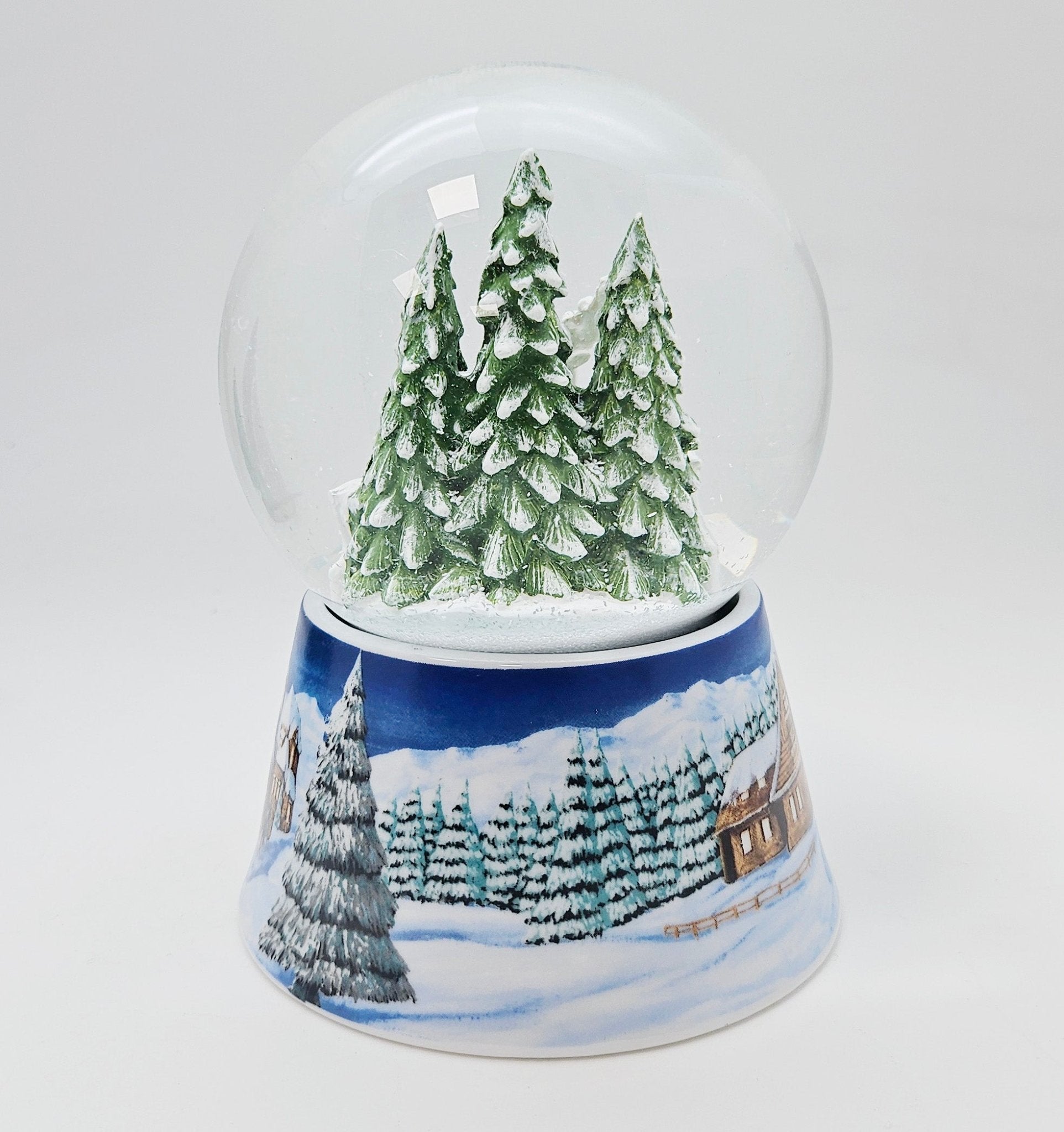 Nostalgische Schneekugel 2 Rehe auf Sockel Winterlandschaft mittelblau 100 mm Durchmesser mit Spieluhr - Schneekugelhaus