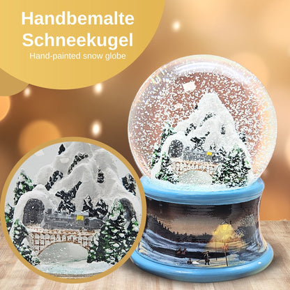 Nostalgische Schneekugel Berg mit Brücke Winterlandschaft blauer Rand 100 mm Durchmesser mit Spieluhr - Schneekugelhaus