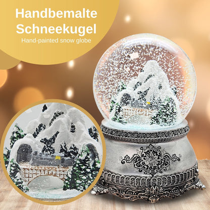 Nostalgische Schneekugel Berglandschaft mit Brücke auf Zinnsockel 100 mm Durchmesser mit Spieluhr - Schneekugelhaus