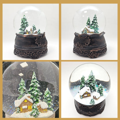 Nostalgische Schneekugel Hüttenzauber Berghütte auf Ornamentsockel kupfer antik 100 mm Durchmesser mit Spieluhr - Schneekugelhaus